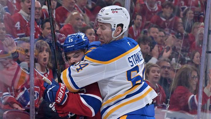May 10, 2026; Montreal, Quebec, CAN; Buffalo Sabres defenseman Logan Stanley (64) checks Montreal Canadiens forward Alex Newhook (15) during the first period in game three of the second round of the 2026 Stanley Cup Playoffs at the Bell Centre. Mandatory Credit: Eric Bolte-Imagn Images May 10, 2026; Montreal, Quebec, CAN; Buffalo Sabres defenseman Logan Stanley (64) checks Montreal Canadiens forward Alex Newhook (15) during the first period in game three of the second round of the 2026 Stanley Cup Playoffs at the Bell Centre. Mandatory Credit: Eric Bolte-Imagn Images