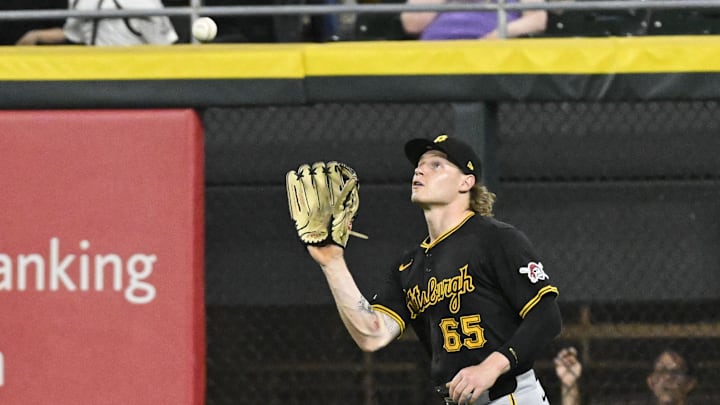 Jul 12, 2024; Chicago, Illinois, USA;  Pittsburgh Pirates outfielder Jack Suwinski (65) catches a fly ball hit by Chicago White Sox catcher Korey Lee (26) during the seventh inning at Guaranteed Rate Field. Mandatory Credit: Matt Marton-Imagn Images