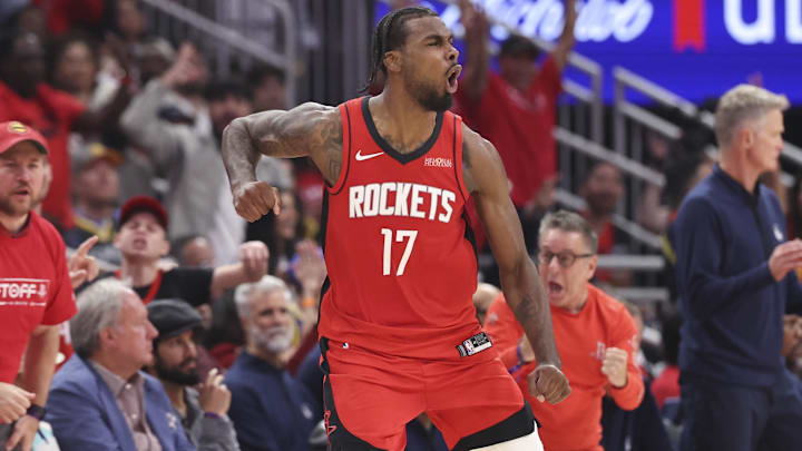 Apr 23, 2025; Houston, Texas, USA; Houston Rockets forward Tari Eason (17) reacts after making a basket during the second quarter during game two of the first round for the 2024 NBA Playoffs against the Golden State Warriors at Toyota Center. Mandatory Credit: Troy Taormina-Imagn Images