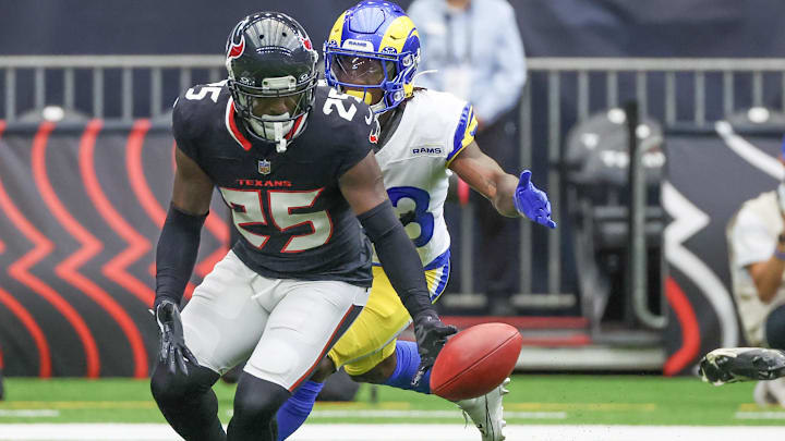 Aug 24, 2024; Houston, Texas, USA; Houston Texans cornerback Desmond King II (25) fumbles against Los Angeles Rams cornerback Cam Lampkin (33) in the first quarter at NRG Stadium. Mandatory Credit: Thomas Shea-Imagn Images Aug 24, 2024; Houston, Texas, USA; Houston Texans cornerback Desmond King II (25) fumbles against Los Angeles Rams cornerback Cam Lampkin (33) in the first quarter at NRG Stadium. Mandatory Credit: Thomas Shea-Imagn Images