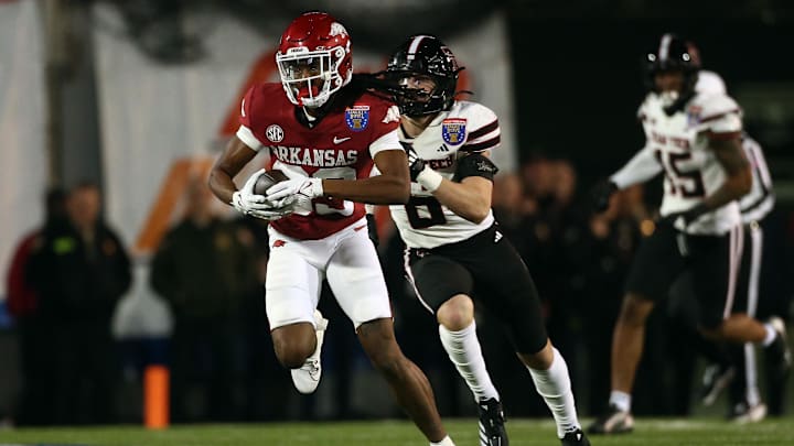 Arkansas Razorbacks wide receiver Dazmin James (83) runs after a catch during the second quarter against the Texas Tech Red Raiders at Simmons Bank Liberty Stadium. Arkansas Razorbacks wide receiver Dazmin James (83) runs after a catch during the second quarter against the Texas Tech Red Raiders at Simmons Bank Liberty Stadium.