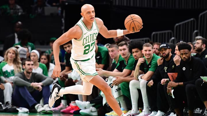 Oct 13, 2024; Boston, Massachusetts, USA;  Boston Celtics guard Jordan Walsh (27) controls the ball during the first half against the Toronto Raptors at TD Garden. Mandatory Credit: Bob DeChiara-Imagn Images