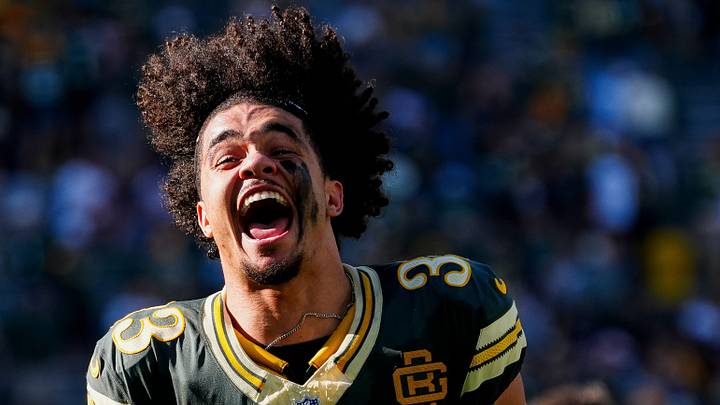 Green Bay Packers safety Evan Williams (33) celebrates as he runs off the field after defeating the Chicago Bears.