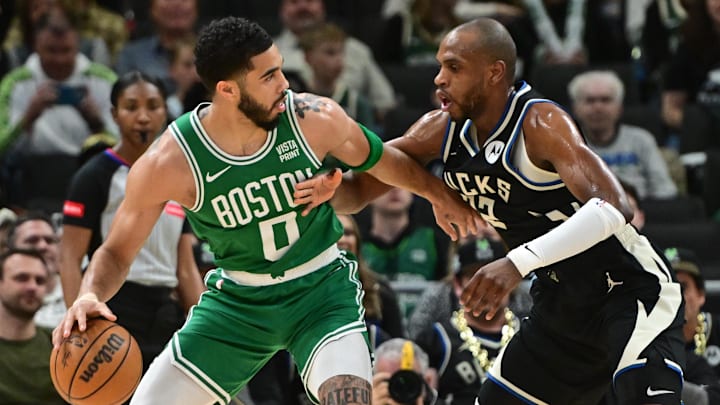 Jayson Tatum. Khris Middleton