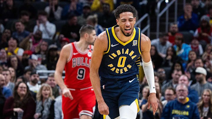 Jan 8, 2025; Indianapolis, Indiana, USA; Indiana Pacers guard Tyrese Haliburton (0) celebrates a basket in the first half against the Chicago Bulls at Gainbridge Fieldhouse. Mandatory Credit: Trevor Ruszkowski-Imagn Images