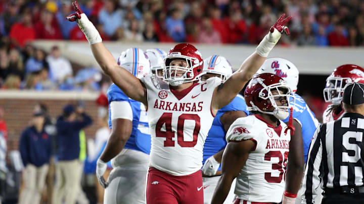 Oct 7, 2023; Oxford, Mississippi, USA; Arkansas Razorbacks defensive linemen Landon Jackson (40) reacts after a made field goal during the first half against the Mississippi Rebels at Vaught-Hemingway Stadium. Mandatory Credit: Petre Thomas-Imagn Images