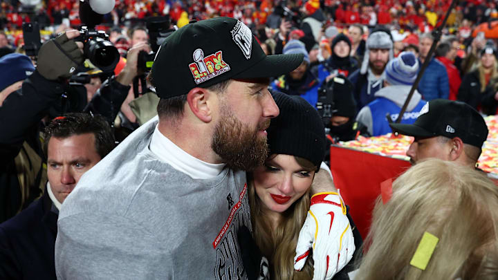 Jan 26, 2025; Kansas City, MO, USA; Recording artist Taylor Swift  and Kansas City Chiefs tight end Travis Kelce (87) react after the AFC Championship game against the Buffalo Bills at GEHA Field at Arrowhead Stadium. 