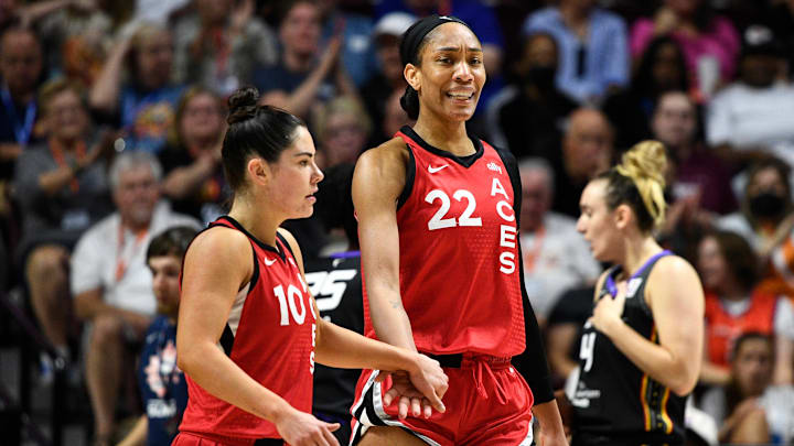  Las Vegas Aces center A'ja Wilson (22) and Las Vegas Aces guard Kelsey Plum (10) high five during a September 6, 2024 WNBA game.