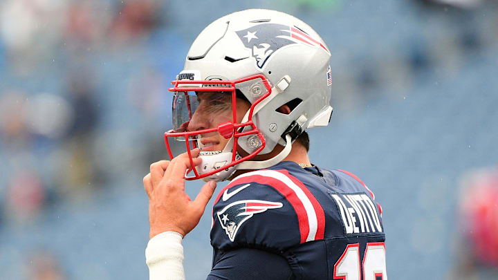 Sep 7, 2025; Foxborough, Massachusetts, USA; New England Patriots quarterback Tommy DeVito (16) practices before the game against the Las Vegas Raiders at Gillette Stadium. Sep 7, 2025; Foxborough, Massachusetts, USA; New England Patriots quarterback Tommy DeVito (16) practices before the game against the Las Vegas Raiders at Gillette Stadium.