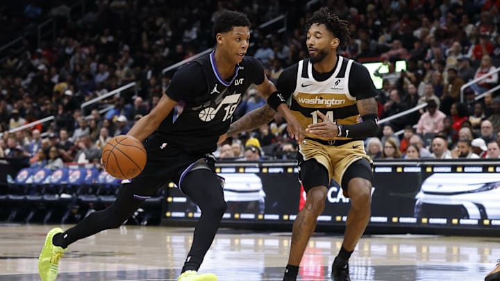 Mar 5, 2026; Washington, District of Columbia, USA; Utah Jazz guard Ace Bailey (19) drives to the basket as Washington Wizards forward Leaky Black (14) defends in the second half at Capital One Arena. Mandatory Credit: Geoff Burke-Imagn Images