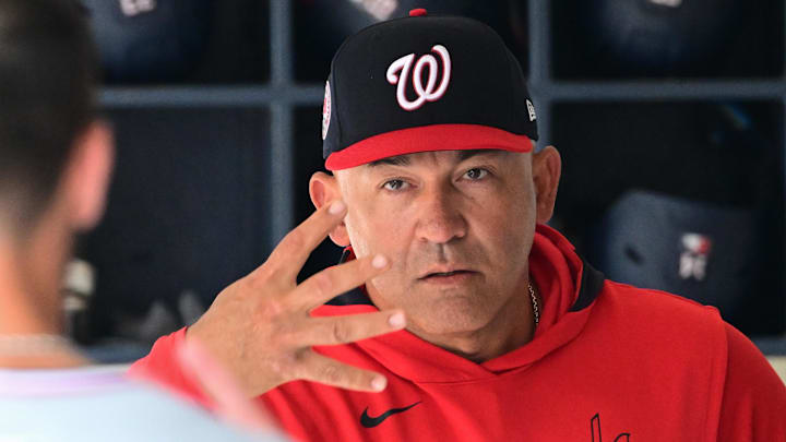 Jul 13, 2025; Milwaukee, Wisconsin, USA;  Washington Nationals interim manager Miguel Cairo talks to players before the game against the Milwaukee Brewers at American Family Field.