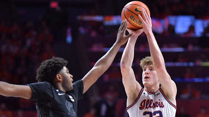 Feb 15, 2025; Champaign, Illinois, USA; Illinois Fighting Illini guard Kasparas Jakucionis (32) shoots the ball over Michigan State Spartans guard Jase Richardson (11) during the first half at State Farm Center. Mandatory Credit: Ron Johnson-Imagn Images Feb 15, 2025; Champaign, Illinois, USA; Illinois Fighting Illini guard Kasparas Jakucionis (32) shoots the ball over Michigan State Spartans guard Jase Richardson (11) during the first half at State Farm Center. Mandatory Credit: Ron Johnson-Imagn Images