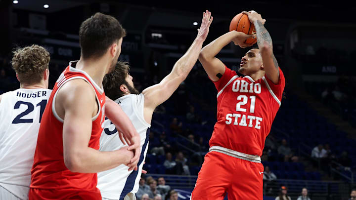 Ohio State forward Devin Royal shoots the ball against Penn State forward Ivan Juric.
