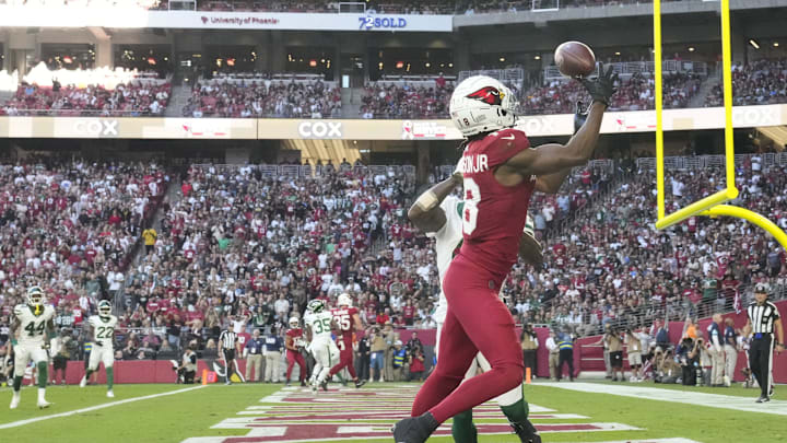 Arizona Cardinals wide receiver Marvin Harrison Jr. (18) catches a touchdown pass against New York Jets cornerback D.J. Reed (4) during the second quarter at State Farm Stadium on Nov 10, 2024, in Glendale. Arizona Cardinals wide receiver Marvin Harrison Jr. (18) catches a touchdown pass against New York Jets cornerback D.J. Reed (4) during the second quarter at State Farm Stadium on Nov 10, 2024, in Glendale.