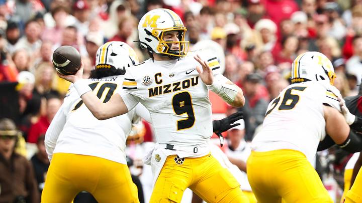 Nov 22, 2025; Norman, Oklahoma, USA; Missouri Tigers quarterback Beau Pribula (9) throws during the game against the Oklahoma Sooners at Gaylord Family-Oklahoma Memorial Stadium. Mandatory Credit: Kevin Jairaj-Imagn Images Nov 22, 2025; Norman, Oklahoma, USA; Missouri Tigers quarterback Beau Pribula (9) throws during the game against the Oklahoma Sooners at Gaylord Family-Oklahoma Memorial Stadium. Mandatory Credit: Kevin Jairaj-Imagn Images