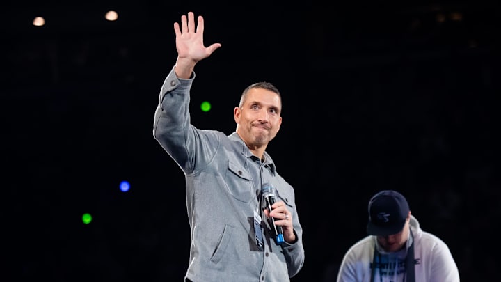 Penn State football head coach Matt Campbell waves to the crowd during a Big Ten wrestling dual meet against Nebraska.