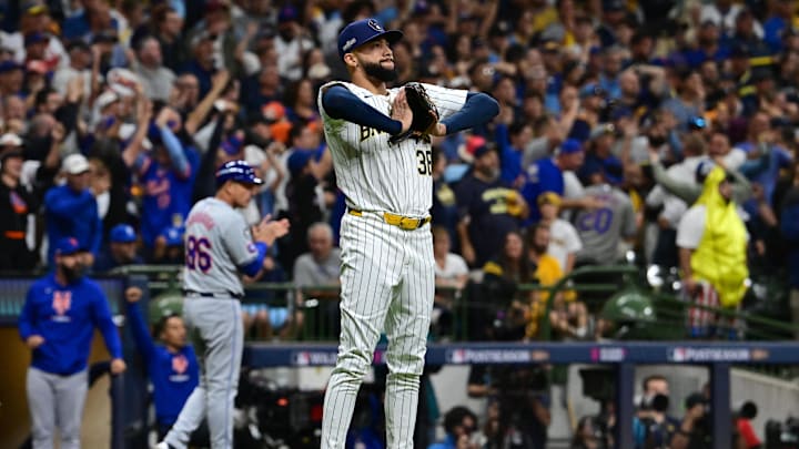 Oct 3, 2024; Milwaukee, Wisconsin, USA; Milwaukee Brewers pitcher Devin Williams (38) reacts in the ninth inning against the New York Mets during game three of the Wildcard round for the 2024 MLB Playoffs at American Family Field. Mandatory Credit: Benny Sieu-Imagn Images