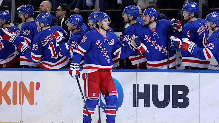 Feb 5, 2025; New York, New York, USA; New York Rangers left wing Chris Kreider (20) celebrates his short handed goal against the Boston Bruins with teammates during the third period at Madison Square Garden. Mandatory Credit: Brad Penner-Imagn Images