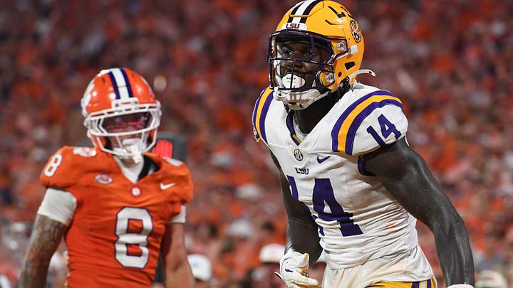 LSU Tigers tight end Trey'Dez Green (14) catches a pass for a touchdown while being defended by Clemson Tigers cornerback Avieon Terrell (8) Saturday, Aug. 30, 2025 during the NCAA football game at Memorial Stadium in Clemson, South Carolina. LSU Tigers won 17-10. LSU Tigers tight end Trey'Dez Green (14) catches a pass for a touchdown while being defended by Clemson Tigers cornerback Avieon Terrell (8) Saturday, Aug. 30, 2025 during the NCAA football game at Memorial Stadium in Clemson, South Carolina. LSU Tigers won 17-10.