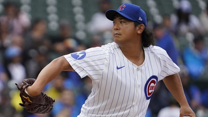 Sep 22, 2024; Chicago, Illinois, USA; Chicago Cubs pitcher Shota Imanaga (18) throws the ball against the Washington Nationals during the first inning at Wrigley Field. Sep 22, 2024; Chicago, Illinois, USA; Chicago Cubs pitcher Shota Imanaga (18) throws the ball against the Washington Nationals during the first inning at Wrigley Field.