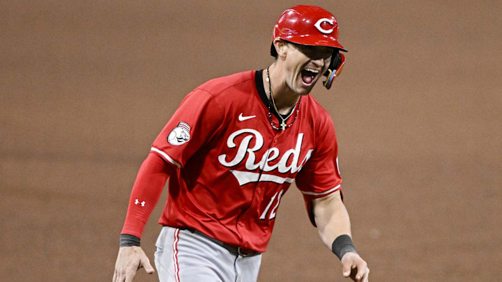 Sep 8, 2025; San Diego, California, USA; Cincinnati Reds left fielder Austin Hays (12) celebrates after hitting a solo home run during the sixth inning against the San Diego Padres at Petco Park. Mandatory Credit: Denis Poroy-Imagn Images