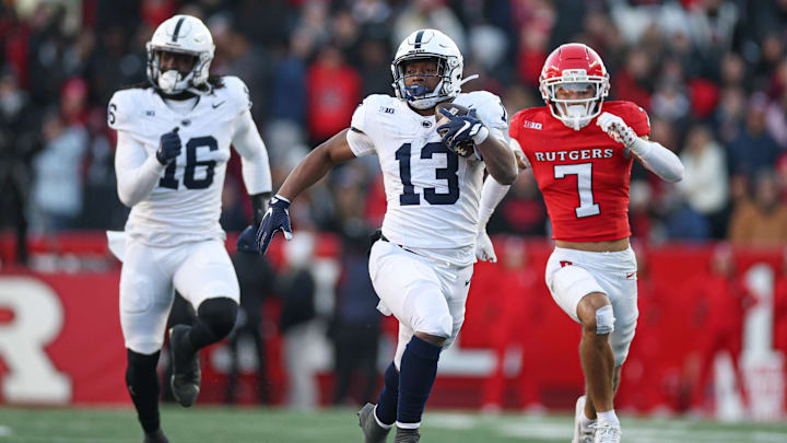Penn State Nittany Lions running back Kaytron Allen (13) runs with the ball during the first half against the Rutgers Scarlet Knights at SHI Stadium. 