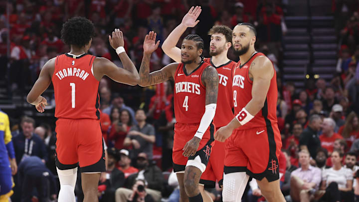 Apr 23, 2025; Houston, Texas, USA; Houston Rockets guard Jalen Green (4) and forward Amen Thompson (1) react after a play during the fourth quarter during game two of the first round for the 2024 NBA Playoffs against the Golden State Warriors at Toyota Center. Mandatory Credit: Troy Taormina-Imagn Images