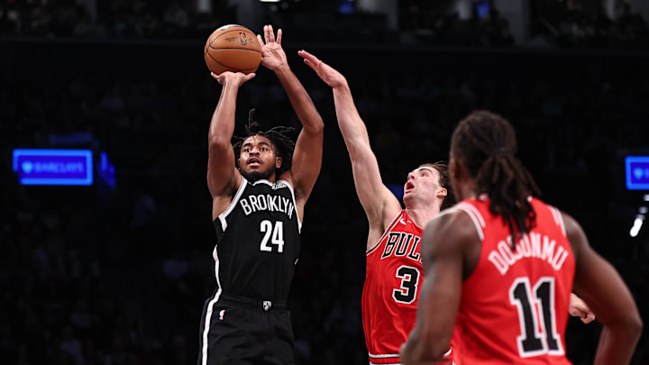 Nov 1, 2024; Brooklyn, New York, USA; Brooklyn Nets guard Cam Thomas (24) makes a three point basket during the fourth quarter as Chicago Bulls guard Josh Giddey (3) defends at Barclays Center. Mandatory Credit: Vincent Carchietta-Imagn Images Nov 1, 2024; Brooklyn, New York, USA; Brooklyn Nets guard Cam Thomas (24) makes a three point basket during the fourth quarter as Chicago Bulls guard Josh Giddey (3) defends at Barclays Center. Mandatory Credit: Vincent Carchietta-Imagn Images