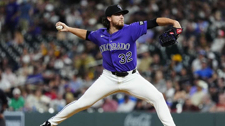Apr 21, 2026; Denver, Colorado, USA; Colorado Rockies pitcher Chase Dollander (32) throws in the fourth inning against the San Diego Padres at Coors Field. Mandatory Credit: Ron Chenoy-Imagn Images
