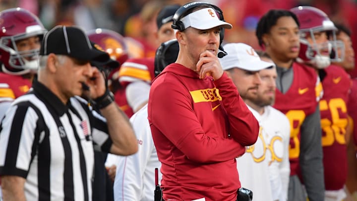 Nov 16, 2024; Los Angeles, California, USA; Southern California Trojans head coach Lincoln Riley watches game action against the Nebraska Cornhuskers during the second half at the Los Angeles Memorial Coliseum. Mandatory Credit: Gary A. Vasquez-Imagn Images