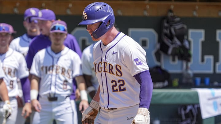 May 31, 2024; Chapel Hill, NC, USA; LSU first baseman Jared Jones (22) trots onto home plate after hitting the tying home run against the Wofford Terriers during the NCAA Regional in Chapel Hill. Mandatory Credit: Jim Dedmon-Imagn Images