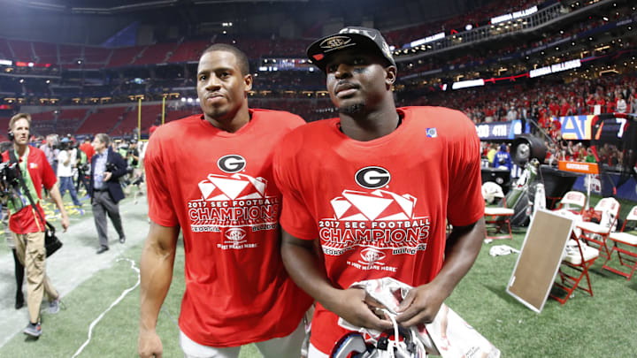Dec 2, 2017; Atlanta, GA, USA; Georgia Bulldogs running back Nick Chubb (left) and running back Sony Michel (right) celebrate after defeating the Auburn Tigers in the SEC Championship game at Mercedes-Benz Stadium. Mandatory Credit: Brett Davis-Imagn Images