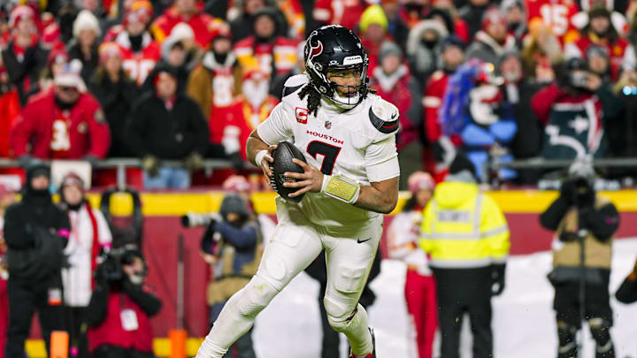 Jan 18, 2025; Kansas City, Missouri, USA; Houston Texans quarterback C.J. Stroud (7) rolls out to pass during the second half against the Kansas City Chiefs in a 2025 AFC divisional round game at GEHA Field at Arrowhead Stadium. Mandatory Credit: Jay Biggerstaff-Imagn Images Jan 18, 2025; Kansas City, Missouri, USA; Houston Texans quarterback C.J. Stroud (7) rolls out to pass during the second half against the Kansas City Chiefs in a 2025 AFC divisional round game at GEHA Field at Arrowhead Stadium. Mandatory Credit: Jay Biggerstaff-Imagn Images