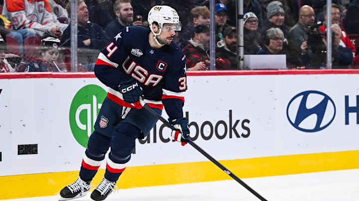 Feb 13, 2025; Montreal, Quebec, CAN; [Imagn Images direct customers only] Team USA forward Auston Matthews (34) plays the puck against Team Finland in the second period during a 4 Nations Face-Off ice hockey game at Bell Centre. Mandatory Credit: David Kirouac-Imagn Images