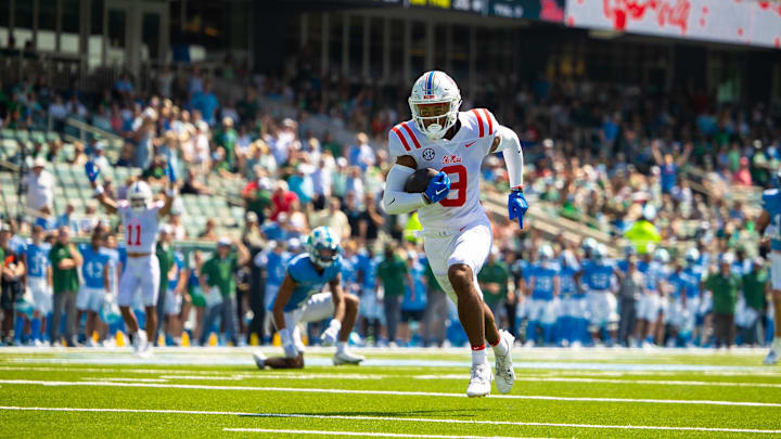 Sep 9, 2023; New Orleans, Louisiana, USA;   Mississippi Rebels wide receiver Tre Harris (9) catches a pass for a touchdown against the Tulane Green Wave during the first half at Yulman Stadium. Mandatory Credit: Stephen Lew-USA TODAY Sports
