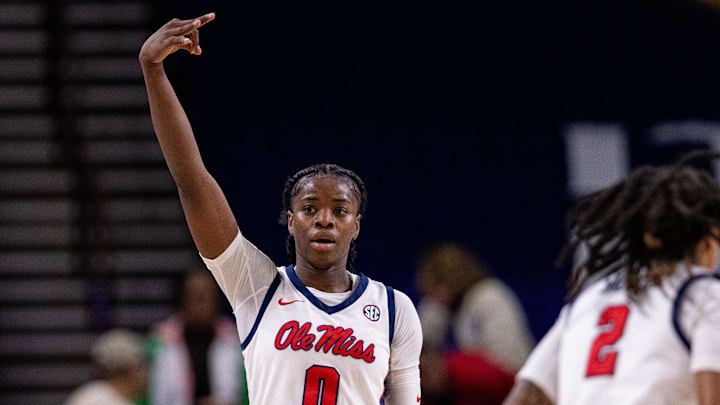 Mar 6, 2025; Greenville, SC, USA; Ole Miss Rebels guard Sira Thienou (0) celebrates a three during the first half against the Mississippi State Bulldogs at Bon Secours Wellness Arena. Mandatory Credit: Scott Kinser-Imagn Images