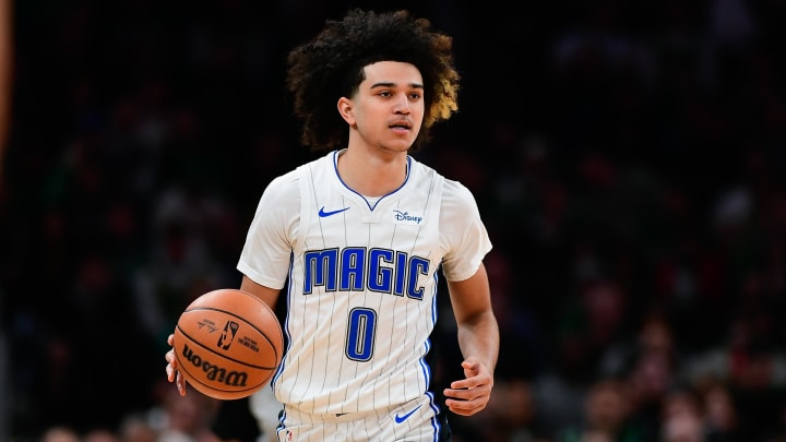 Orlando Magic guard Anthony Black (0) dribbles the ball against the Boston Celtics during the first half at TD Garden. Orlando Magic guard Anthony Black (0) dribbles the ball against the Boston Celtics during the first half at TD Garden.