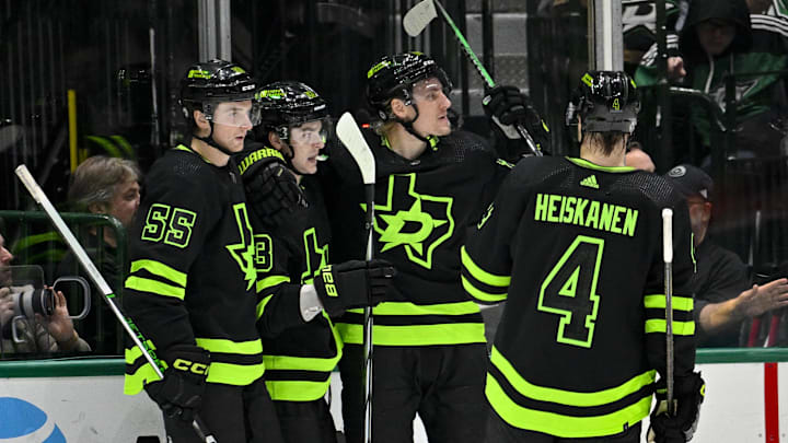 Jan 27, 2024; Dallas, Texas, USA; Dallas Stars defenseman Thomas Harley (55) and center Wyatt Johnston (53) and center Roope Hintz (24) and defenseman Miro Heiskanen (4) celebrates a goal scored by Johnston against the Washington Capitals during the first period at the American Airlines Center. Mandatory Credit: Jerome Miron-Imagn Images