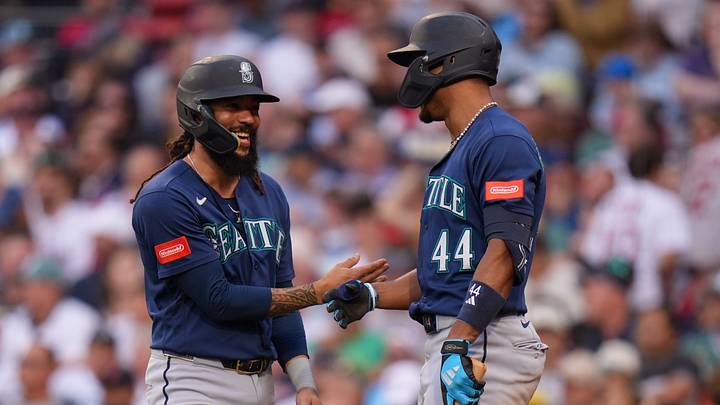 Sep 2, 2026; Boston, Massachusetts, USA; Seattle Mariners shortstop J.P. Crawford (3) is congratulated by center fielder Julio Rodríguez (44) after scoring against the Boston Red Sox in the sixth inning at Fenway Park. Mandatory Credit: David Butler II-Imagn Images
