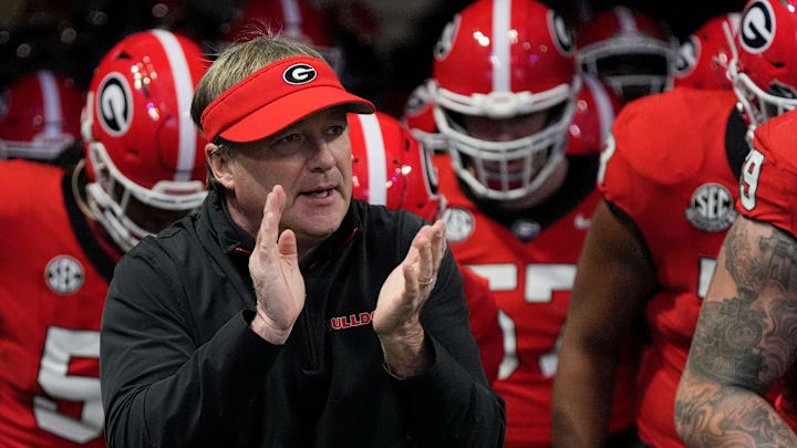 Georgia coach Kirby Smart takes the field with his team before the start of the SEC championship game against Texas in Atlanta, on Saturday, Dec. 7, 2024. Georgia coach Kirby Smart takes the field with his team before the start of the SEC championship game against Texas in Atlanta, on Saturday, Dec. 7, 2024.