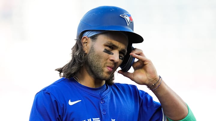 Apr 23, 2024; Kansas City, Missouri, USA; Toronto Blue Jays shortstop Bo Bichette (11) reacts during the first inning against the Kansas City Royals at Kauffman Stadium.