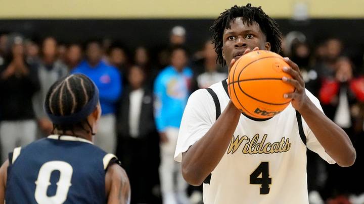 Nov. 11, 2025; Moundville, Alabama, USA; Hale County's Gage Mayfield (4) takes a jump shot against Paul Bryant's Joshua Williams (0) at Hale County High School. Nov. 11, 2025; Moundville, Alabama, USA; Hale County's Gage Mayfield (4) takes a jump shot against Paul Bryant's Joshua Williams (0) at Hale County High School.