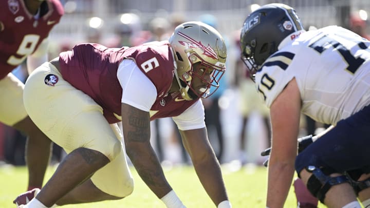 Nov 23, 2024; Tallahassee, Florida, USA; Florida State Seminoles defensive lineman Darrell Jackson Jr. (6) prepares for the snap during the first quarter against the Charleston Southern Buccaneers at Doak S. Campbell Stadium. Mandatory Credit: Melina Myers-Imagn Images