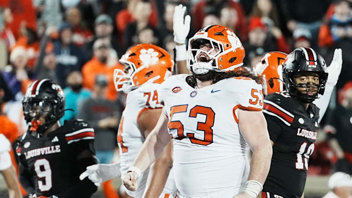 Clemson Tigers center Ryan Linthicum (53) celebrates Clemson Tigers running back Adam Randall's touchdown as the Tigers beat Louisville at L&N Stadium in Louisville, Kentucky Friday, Nov. 14, 2025.