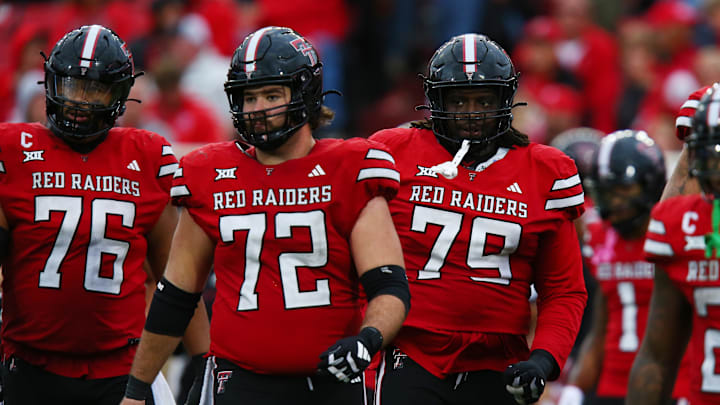 Oct 19, 2024; Lubbock, Texas, USA;  Texas Tech Red Raiders offensive lineman Caleb Rogers (76), offensive center Sheridan Wilson (72) and offensive lineman Sterling Porcher (79) run onto the field in the second half against the Baylor Bears at Jones AT&T Stadium and Cody Campbell Field. Mandatory Credit: Michael C. Johnson-Imagn Images