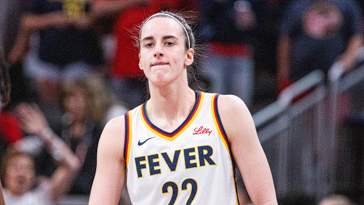 Jul 9, 2025; Indianapolis, Indiana, USA; Indiana Fever guard Caitlin Clark (22) in the first half against Golden State Valkyries at Gainbridge Fieldhouse. Mandatory Credit: Trevor Ruszkowski-Imagn Images