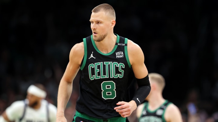 Jun 9, 2024; Boston, Massachusetts, USA; Boston Celtics center Kristaps Porzingis (8) reacts after a play against the Dallas Mavericks during the first quarter in game two of the 2024 NBA Finals at TD Garden. Mandatory Credit: Peter Casey-USA TODAY Sports Jun 9, 2024; Boston, Massachusetts, USA; Boston Celtics center Kristaps Porzingis (8) reacts after a play against the Dallas Mavericks during the first quarter in game two of the 2024 NBA Finals at TD Garden. Mandatory Credit: Peter Casey-USA TODAY Sports