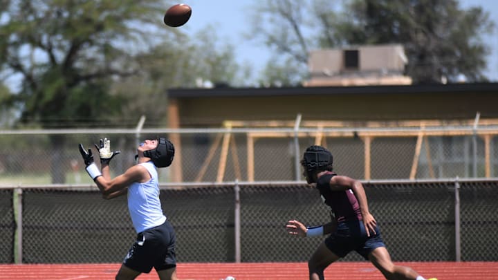A Hale Center player catches a pass against Tulia in the Sudan 7-on-7 football state-qualifying tournament Friday, June 13, 2025, at Hornet Field in Sudan.