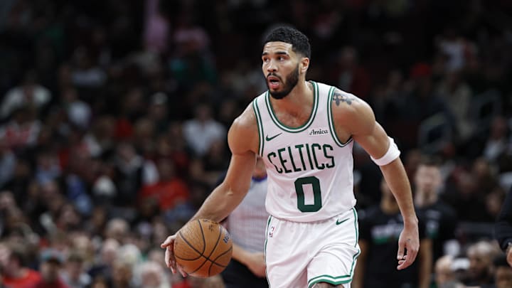 Nov 29, 2024; Chicago, Illinois, USA; Boston Celtics forward Jayson Tatum (0) brings the ball up court against the Chicago Bulls during the second half at United Center. Mandatory Credit: Kamil Krzaczynski-Imagn Images