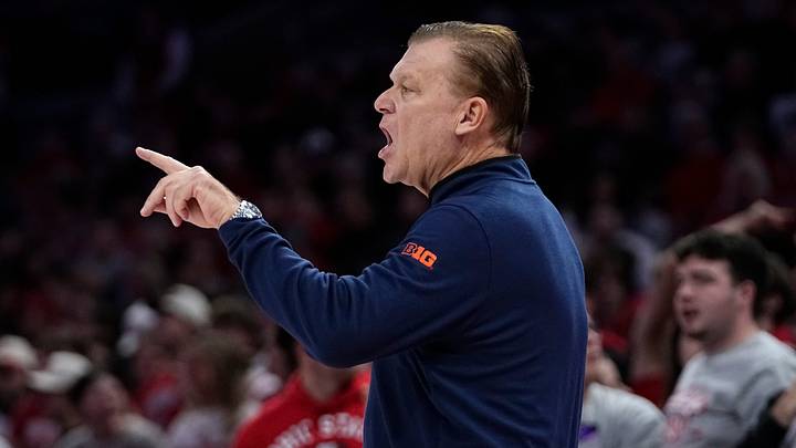Illinois Fighting Illini head coach Brad Underwood motions to his team during the first half of the NCAA men's basketball game against the Ohio State Buckeyes in Columbus on Dec. 9, 2025. Illinois Fighting Illini head coach Brad Underwood motions to his team during the first half of the NCAA men's basketball game against the Ohio State Buckeyes in Columbus on Dec. 9, 2025.